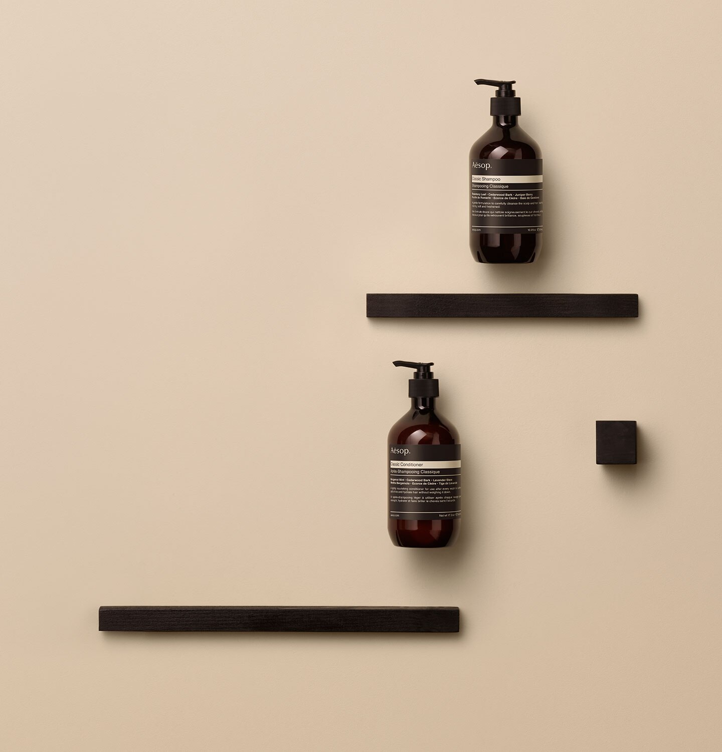 Classic Shampoo and Classic Conditioner in amber recycled plastic bottles.