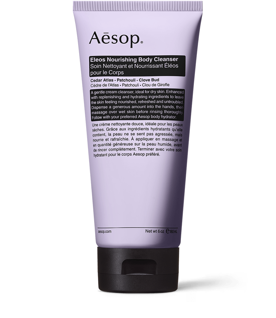 Eleos Nourishing Body Cleanser in a purple tube. 
