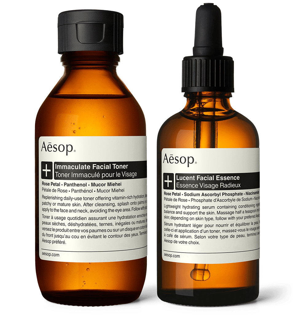Immaculate facial toner and Lucent facial essence bottles placed next to each other