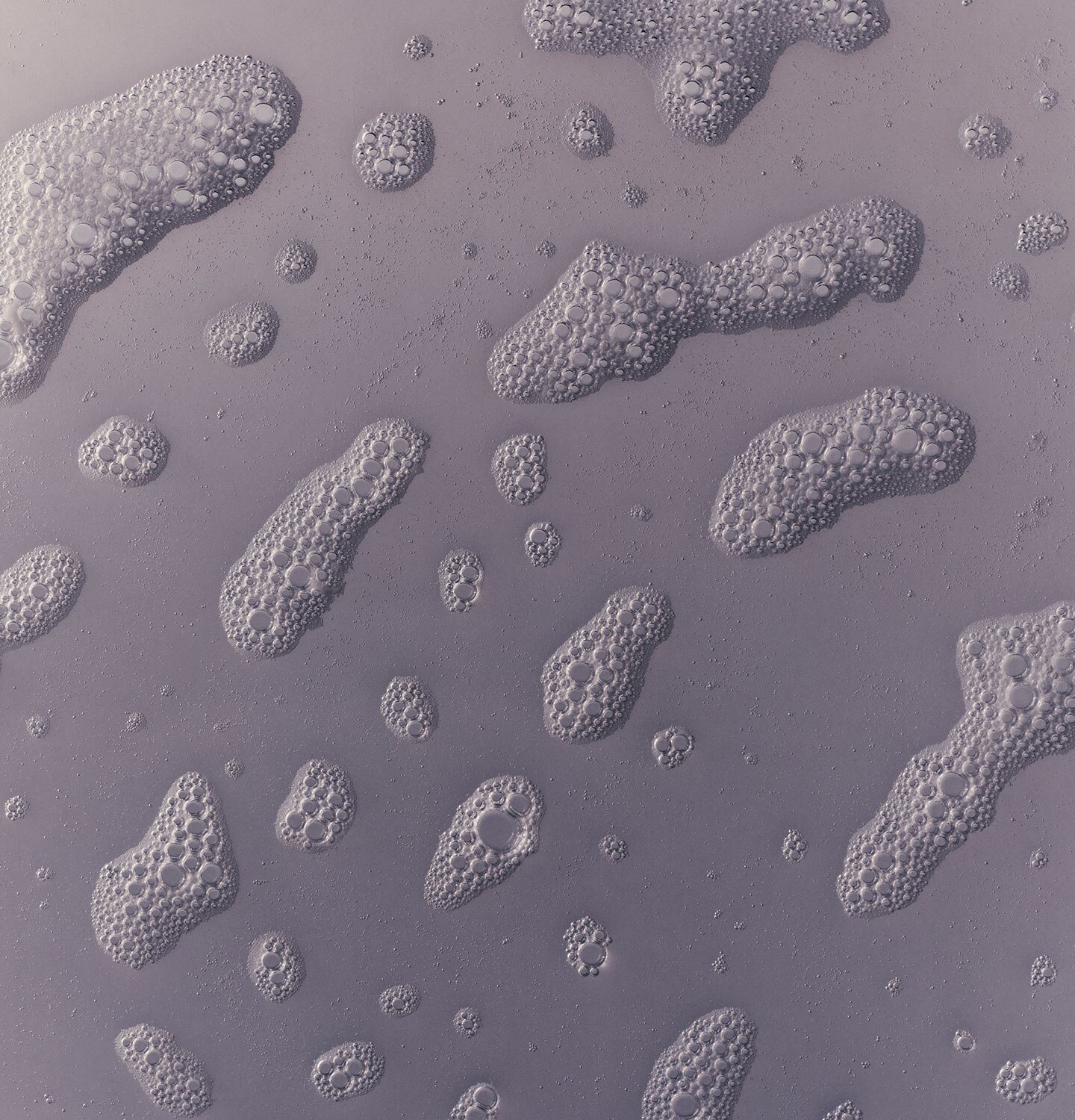 Body cleanser foam in purple background
