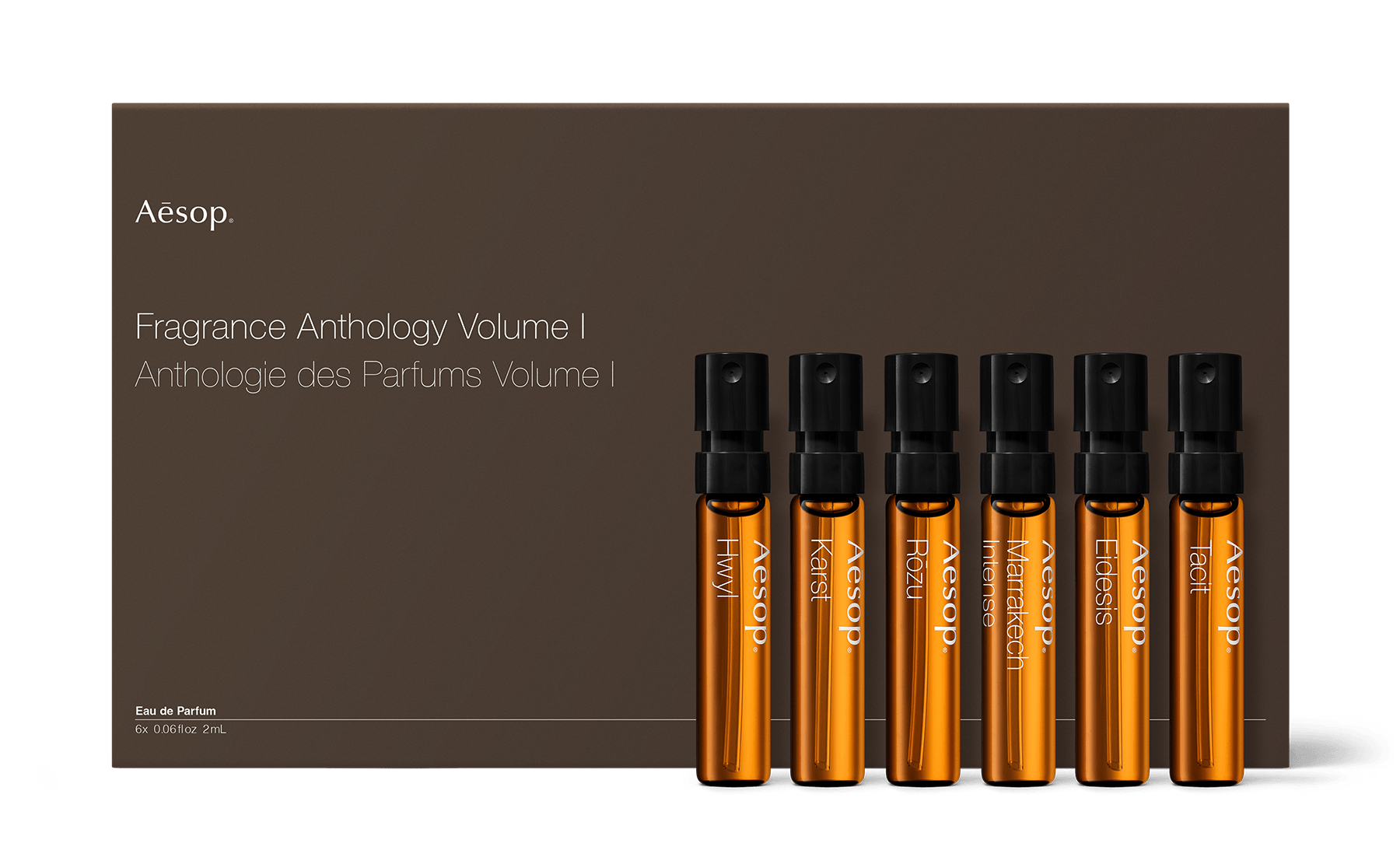 Six small vials of fragrance housed in a paper pulp carton with a decorative sleeve.