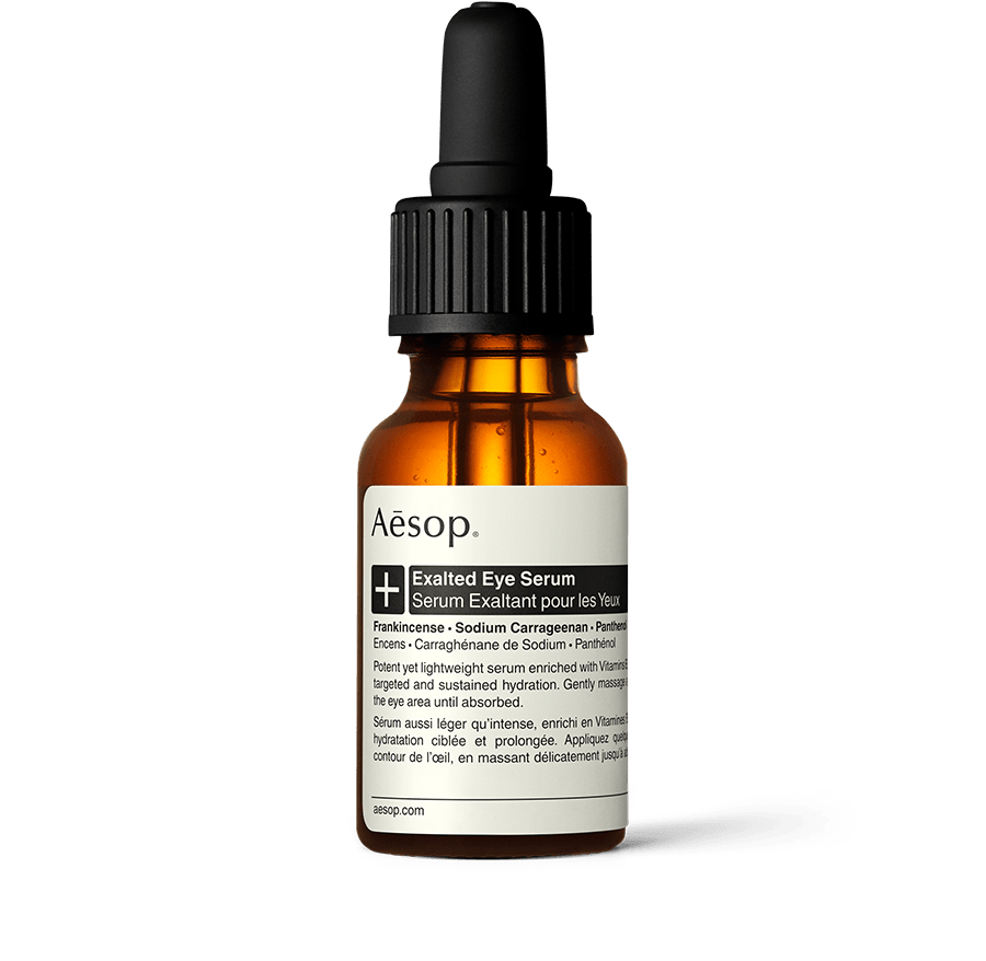 Exalted Eye Serum in an amber glass bottle with a pipette.