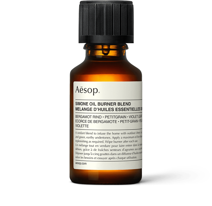 Simone Oil Burner Blend in an amber bottle. 